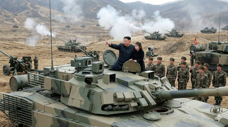 Kim Jong Un sits on a tank with his daughter at a military exercise